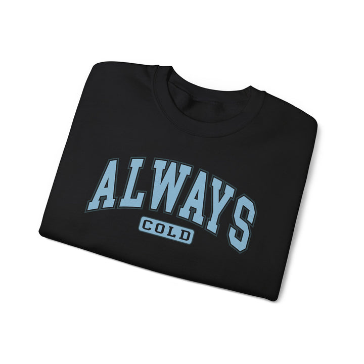Always Cold Varsity Graphic Sweatshirt by Printify featuring a bold graphic design and relaxed fit in a cozy fabric.