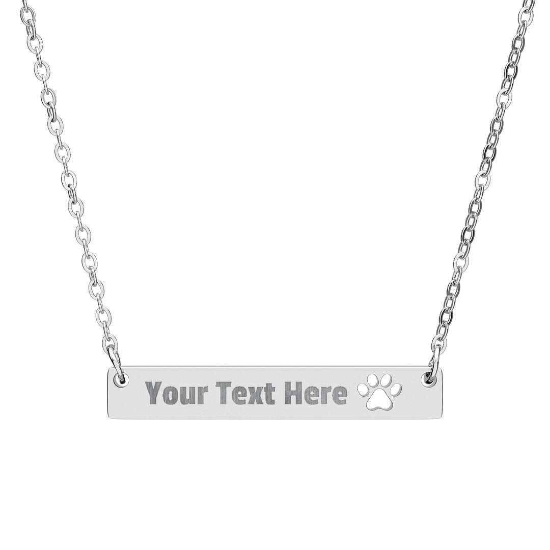 Engraved paw print cutout bar necklace from Printify, featuring a sleek silver pendant with paw print engraving on a chain.