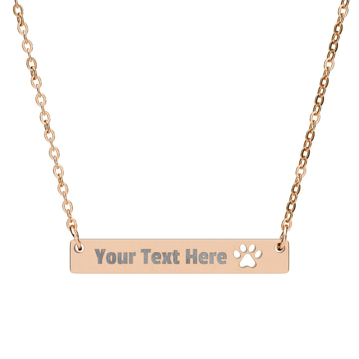 Silver engraved paw print cutout bar necklace from Printify, featuring a sleek design with paw print engraving.