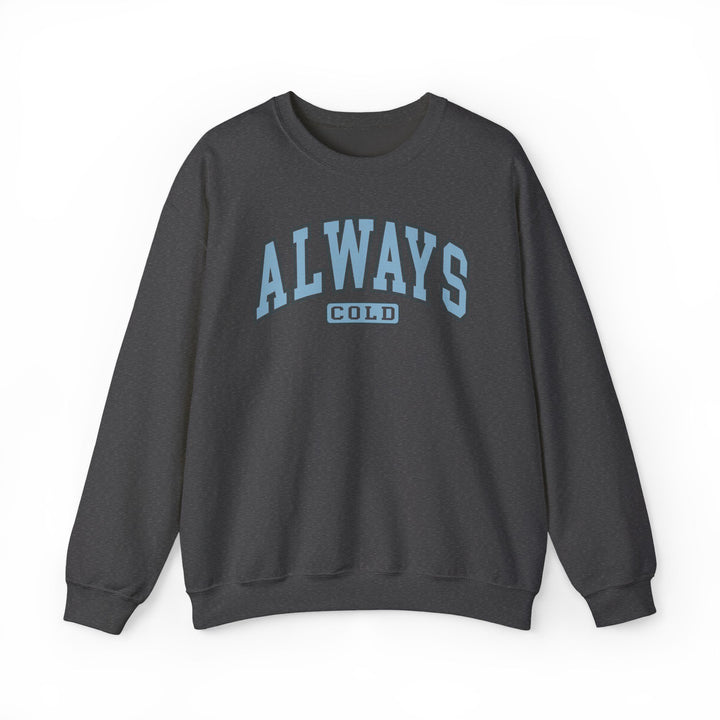 Always Cold Varsity Graphic Sweatshirt by Printify, featuring a bold graphic design and comfortable fit in a casual setting.