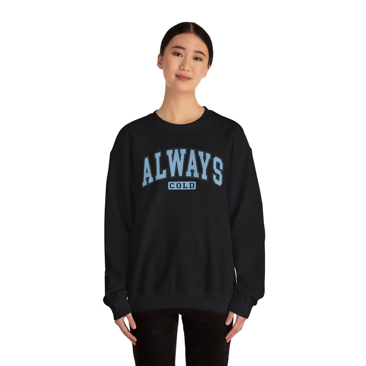 Always Cold Varsity Graphic Sweatshirt by Printify, featuring a bold graphic design on a cozy, casual sweatshirt.