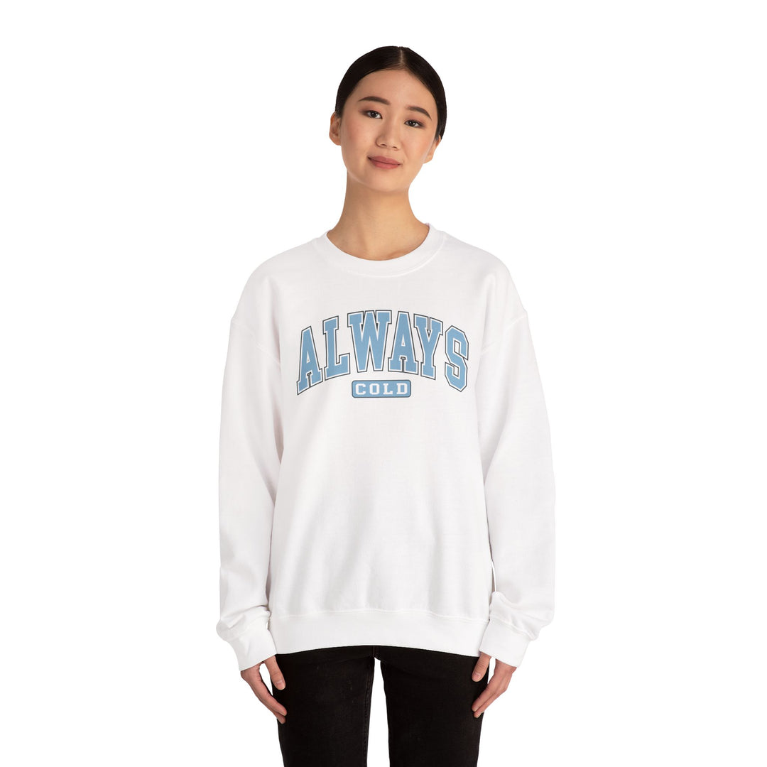 Always Cold Varsity graphic sweatshirt by Printify in a stylish design with bold lettering and a cozy fit.