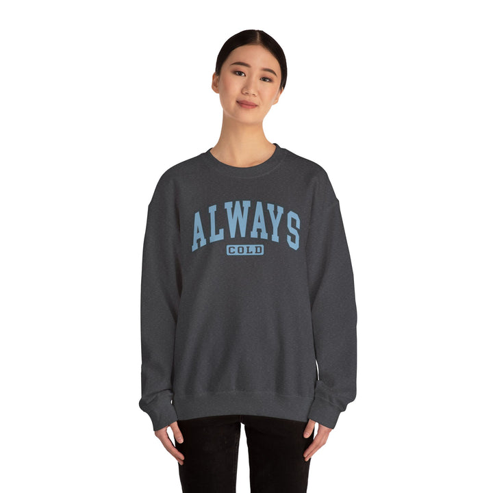Always Cold Varsity Graphic Sweatshirt by Printify in a cozy design featuring a bold varsity-style graphic.
