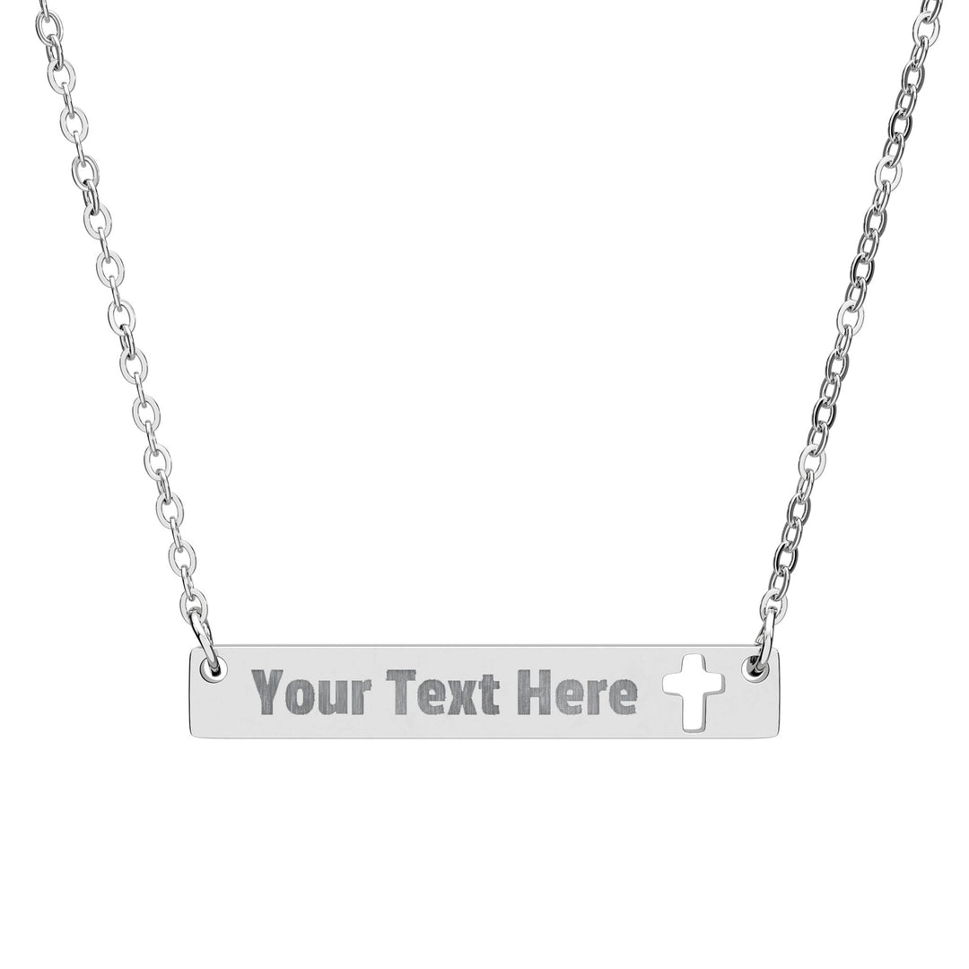Engraved cross cutout bar necklace in accessories, featuring a sleek metal design with detailed engraving and a chain.
