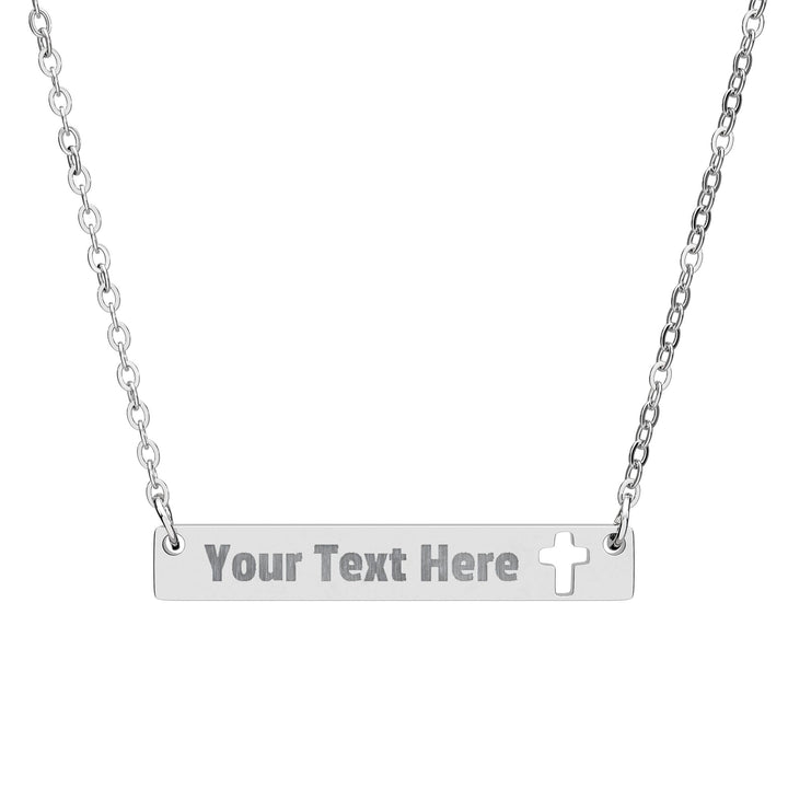 Engraved cross cutout bar necklace in accessories, featuring a sleek metal design with detailed engraving and a chain.