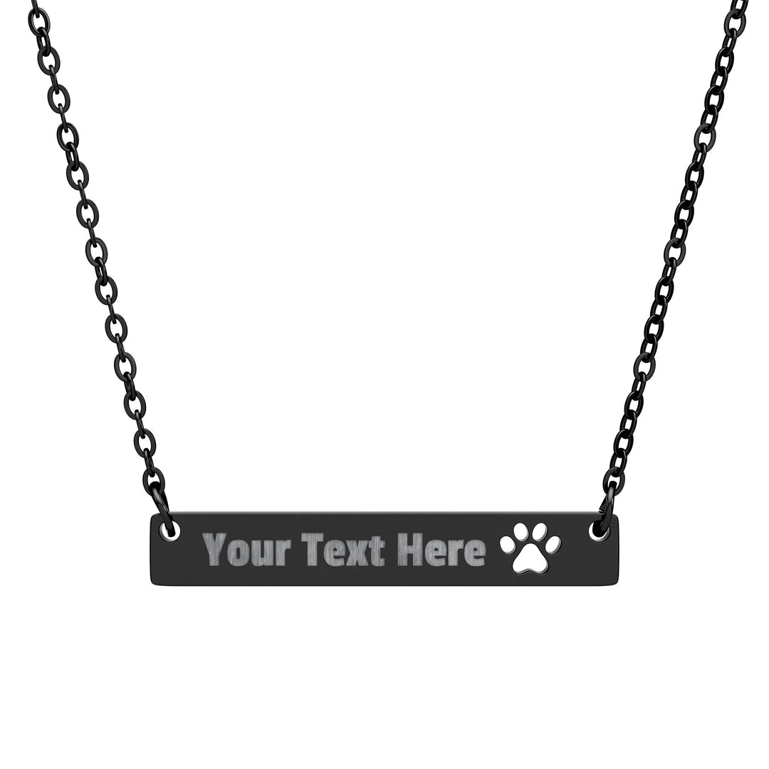 Silver engraved paw print cutout bar necklace from Printify, featuring a sleek design and paw print engraving on a chain.