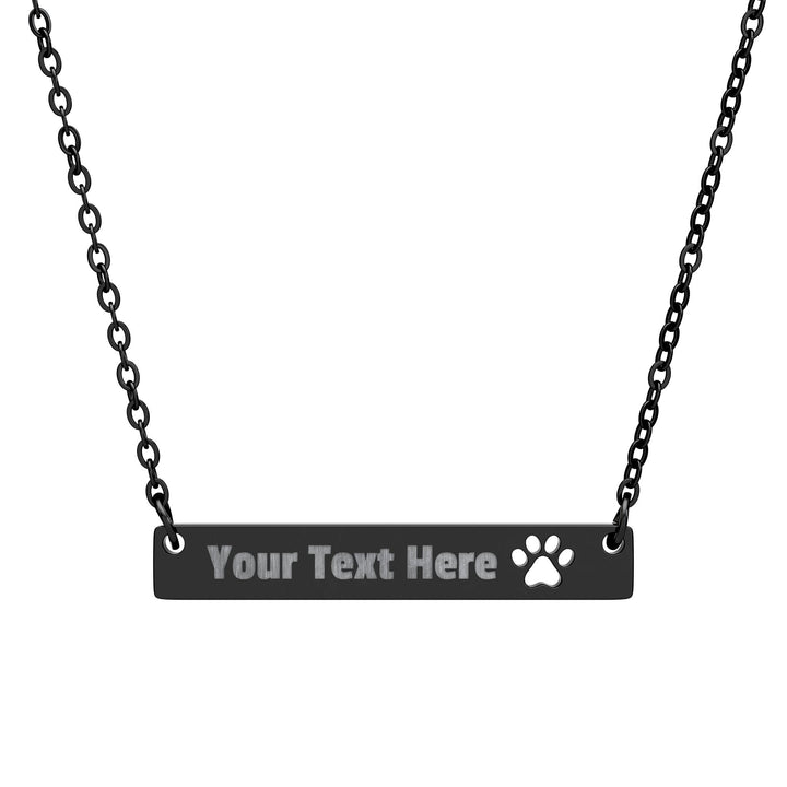 Silver engraved paw print cutout bar necklace from Printify, featuring a sleek design and paw print engraving on a chain.