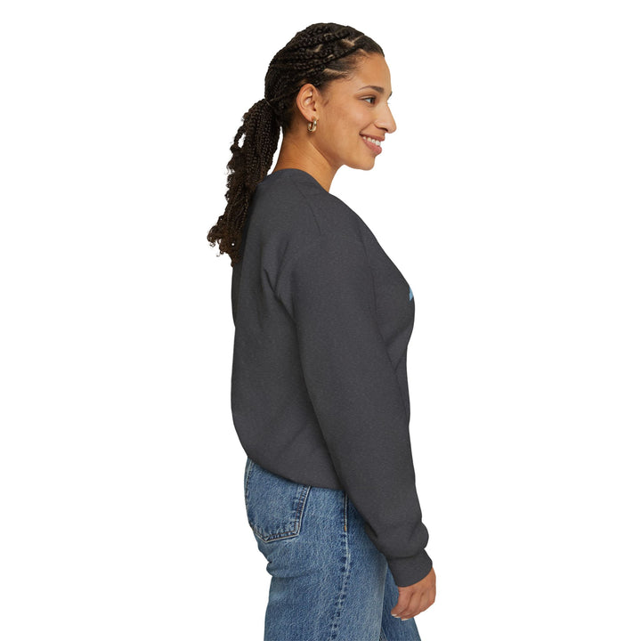 Always Cold Varsity Graphic Sweatshirt by Printify featuring bold graphics and a cozy, relaxed fit in a casual setting.